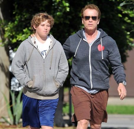 arnold walking with christopher on the street 